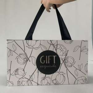 Venta al por mayor personalizado impreso respetuoso con el medio ambiente reciclado de papel Kraft blanco bolso de mano de cartón compras llevar bolsas de papel para los zapatos - Product Image 1