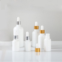 Bouteille de sérum cylindrique vide personnalisée de 100ml 20ml 15ml 30ml 50ml Bouteille d'huile en verre blanc Flacon compte-gouttes d'huile essentielle pour cheveux