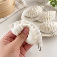 Porte-clés jouet sensoriel anti-stress en TPR blanc, forme dumpling, pour enfants et adolescents de 14 ans et plus, avec chaîne à perles