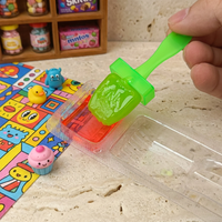 Bonbons durs fruités avec sauce piquante, friandise interactive croustillante et sucrée en boîte pour une explosion de saveurs à chaque bouchée