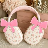 Accessoires mignons en silicone en forme de nœud pour écouteurs, breloques pour casques de jeu, lot de deux