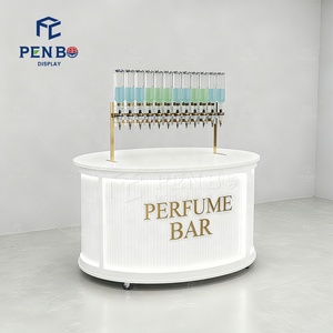 Mostrador de Exhibición Redondo de Madera para Perfumes Personalizado Barra de Perfumes Móvil con Botellas Quiosco de Perfumes de Tamaño Pequeño Diseño en Venta - Product Image 1