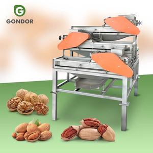 เครื่องแยกเปลือกถั่วสนและเฮเซลนัทเชิงพาณิชย์ เครื่องบดและคัดแยกเมล็ดปาล์มแบบพัดลม - Product Image 1