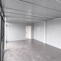 Fabricant professionnel lance une maison de conteneur d'emballage plat mobile à installation rapide préfabriquée