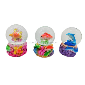 งานฝีมือเรซิ่นแกะสลักลายเปลือก<span class=keywords><strong>เต่า</strong></span>รูปปลาโลมา <span class=keywords><strong>ลูก</strong></span>บอลน้ำคริสตัลขนาดเล็ก ของที่ระลึก <span class=keywords><strong>ลูก</strong></span>โลกหิมะเรซิ่นรูปประภาคาร - Product Image 4