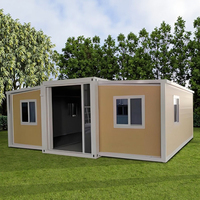 Maison modulaire en conteneur avec cadre noir fabriqué en usine, avec entrée en verre et fenêtres latérales pour villa, jardin, maison préfabriquée en conteneur