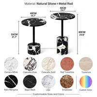 Table d'appoint ronde sur mesure en marbre noir avec base cylindrique et pied en métal pour salon commercial et coin canapé résidentiel