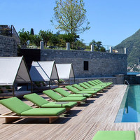 Chaise longue de plage en teck de style nordique pour l'extérieur, en bois massif, multifonctionnelle, personnalisable, avec table basse pour les loisirs en club