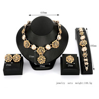 Nouvel ensemble de bijoux pour femme en laiton orné de cristaux et strass, collier, boucles d'oreilles, bague, bracelet, cadeau de mode exquis