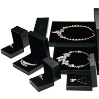 Boîte d'emballage de bijoux de luxe sur mesure chinoise FANXI, boîte à anneaux, collier, pendentif, boîtes cadeaux, boîte d'emballage de bijoux en similicuir noir