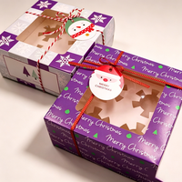 Boîte à gâteau en carton blanc festif et coloré, motif bonhomme de neige de Noël avec fenêtre découpée, pour présentation de pâtisserie de comptoir de fêtes