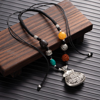Collier Pendentif Rotatif Porte-Bonheur en Graine de Bodhi Vintage pour Femme, en Argent Tibétain et Ambre, Chaîne de Pull Réglable – Vente en Gros