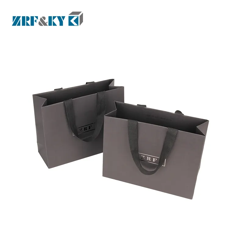 Sacchetti regalo in carta da Shopping grigio opaco con Logo stampato personalizzato di lusso Bolsa De Papel con manico a nastro