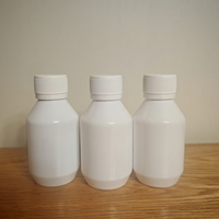 Sirop TUS EF 125 ml, bouteille en plastique blanche avec numéro de lot imprimé, finition brillante, bouchon à vis avec étiquettes et boîte