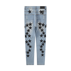 <span class=keywords><strong>Jean</strong></span> skinny délavé avec patchwork d'étoiles noires et effet usé - Product Image 1