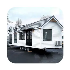 Villa mobile en acier de luxe personnalisée et moderne entièrement meublée et extensible petite maison sur roues avec glissières pour remorque