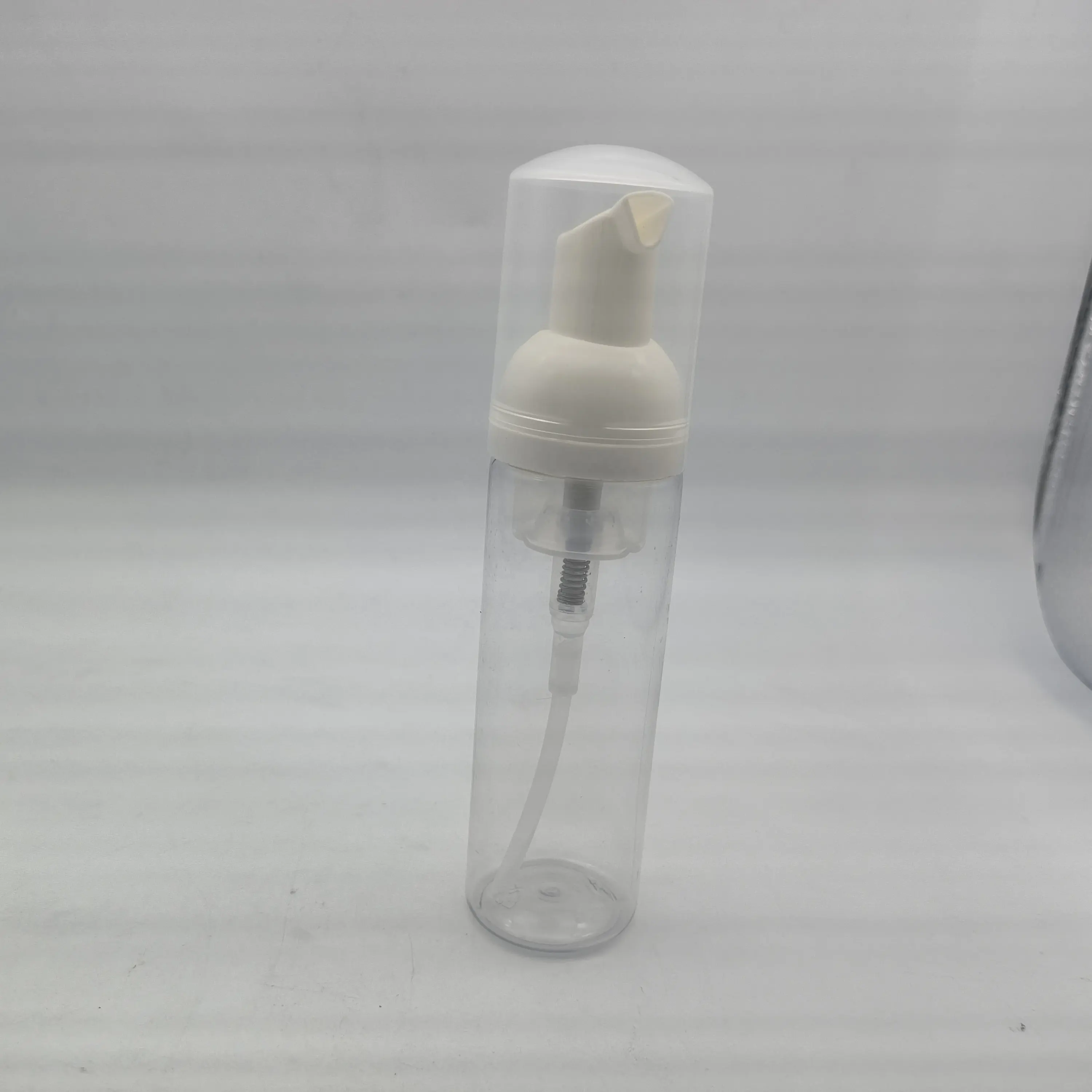 Distributeurs de savon mousse en plastique de 2 oz Bouteilles de shampoing rechargeables avec pompe Mini distributeur de bouteille de mousse de nettoyage de cils pour Refi