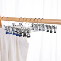 Petits cintres en métal avec revêtement en caoutchouc Cintres à un niveau pour jupe et pantalon pour armoire avec clips