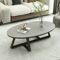 Table basse ovale en marbre de style post-moderne de luxe léger pour les petits appartements, meubles de designer simples pour le salon