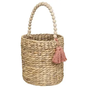 Water Hyacinth Round Storage Basket With Beaded Handle And Pink <b>Tassels</b> Bohemian Style <b>Craft</b> Decor for Kid Room - Product Image 1