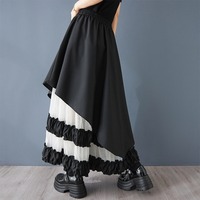 Nouvelle Robe d'été 2026 en gros pour femme, coupe trapèze asymétrique, patchwork en maille, taille haute, ample, noire, style chic français, coupe irrégulière