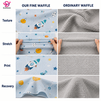 Tela de punto gofrado de poliéster y elastano estampada, de secado rápido y resistente al pelusamiento, venta al por mayor por rollo para fábricas de pijamas infantiles