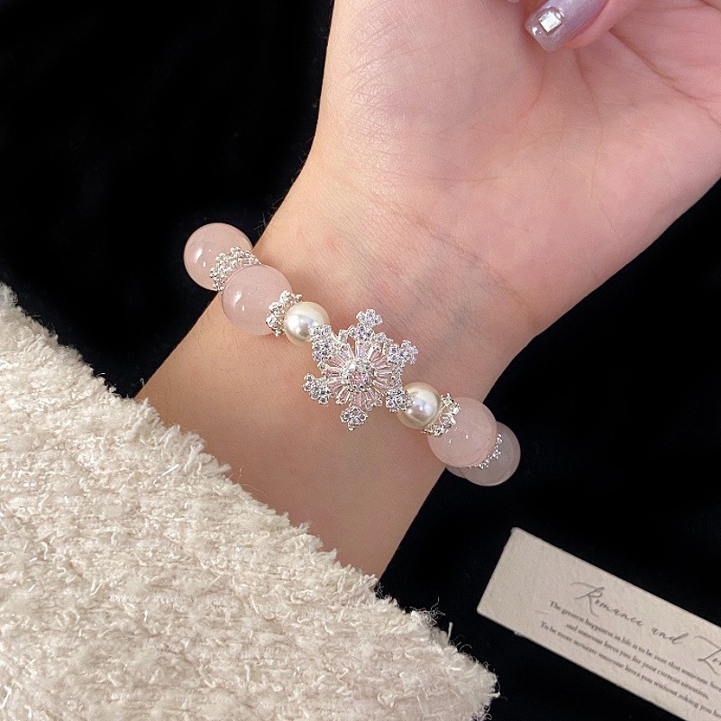 R5753 rotating snowflake pink crystal bracelet