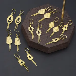 Jxx moda Unisex 24K oro placcato in ottone nicchia lungo ciondolo con orecchie pendenti, vendita all'ingrosso di 30 stili di gioielli