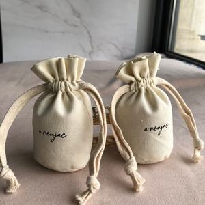 Pequeño de lino de algodón bolsas de embalaje de fondo redondo de lino de algodón con cordón bolsa de viaje - Product Image 1
