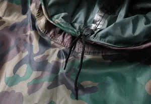 Poncho de pluie imperméable camouflé veste de manteau à capuche de randonnée réutilisable légère pour les activités de plein air pvc personnalisé