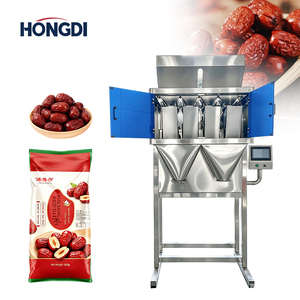 Machine d'emballage semi-automatique à quatre têtes avec double sortie pour granulés, idéale pour l'emballage de céréales, noix et graines alimentaires - Product Image 2