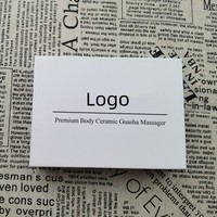 Boîtes en papier de Style livre de haute qualité, outil de Massage de grattage en céramique, boîte d'emballage Gua Sha avec étiquettes privées, Logo personnalisé