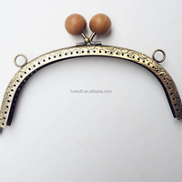 Accessoires de fabrication de serrures en métal pour usine : fermoirs à boucle, poignées de cadre pour sacs à main, portefeuilles, porte-monnaie et composants de serrures
