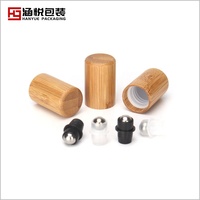 Rouleau sur la bouteille 100 ml 50 ml noir bouteille en verre 30 ml 15 ml bouteille cosmétique rouleau sur avec plafond en bambou pour huile de massage huile essentielle