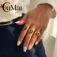 CUMAI Bague en acier inoxydable plaqué or 18 carats avec œil de tigre vintage pour femme, anneau ouvert martelé à pierre ovale, bijoux de mode rétro