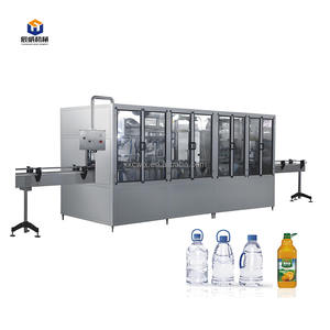 آلة تعبئة وتغطية أوتوماتيكية 3 في 1 للزجاجات البلاستيكية والزجاجية لتعبئة المياه الغازية والقلوية والمعدنية النقية - Product Image 3