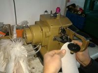 Machine à coudre industrielle à bras long DS-600 avec moteur, programmable à grande vitesse et informatisée pour la couture de poupées, de fourrures et de vêtements pour bébés.