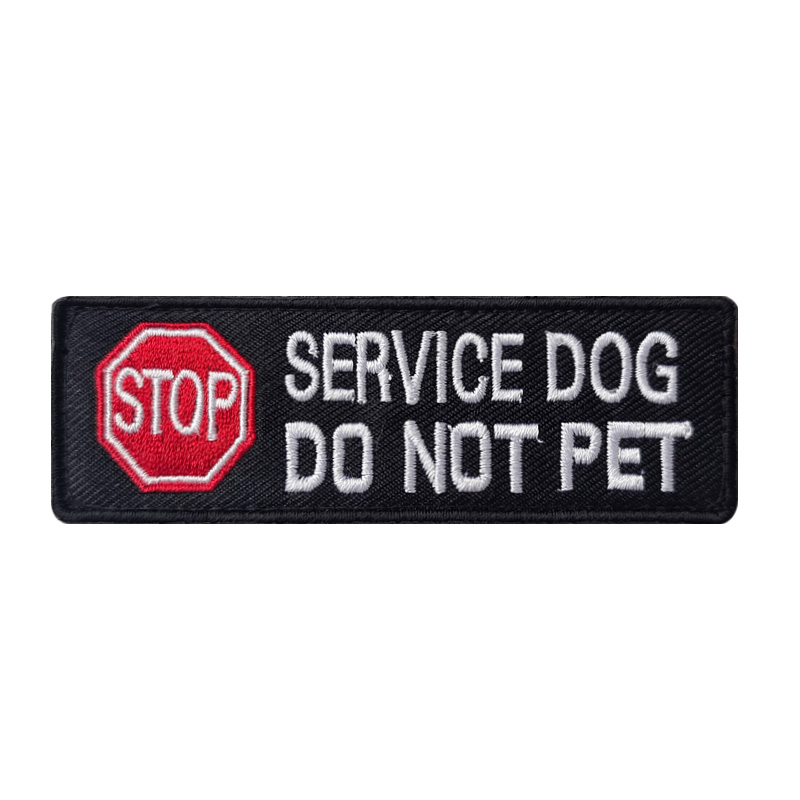Perro de servicio. No acariciar.