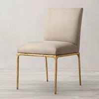 Chaise de salle à manger italienne moderne minimaliste de luxe léger en fer avec accoudoirs et rembourrage doux, pour usage domestique (Guangdong)