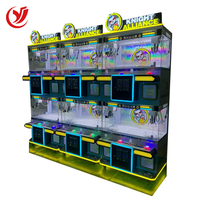 Nouveauté 2026 Mini machine d'arcade d'intérieur à monnayeur pour la distribution de jouets et de cadeaux, Mini machine à griffes pour poupées