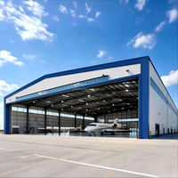 Entrepôt préfabriqué moderne à grande portée en structure métallique, hangar d'avion, panneaux sandwich EPS, certifié CE ISO, 121+mph
