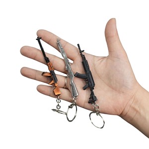 Mini porte-clés en métal, Merchandising de jeu inspiré de *Peacekeeper Elite*, Modèle de pistolet en alliage M4A1, Jouet pour garçons pour le jeu <span class=keywords><strong>Battle</strong></span> <span class=keywords><strong>Royale</strong></span> - Product Image 2