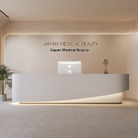 Bureau de réception laqué moderne haut de gamme personnalisé pour les cours de formation en studio de yoga de bureau d'esthétique médicale-pour caissier de réception