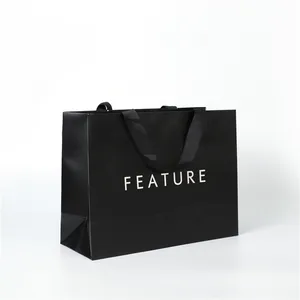 Çeşitli özellikler beyaz kağıt alışveriş hediye çantası gıda alışveriş çantası lüks hediye çantası şerit fabrika satış Sona paketi