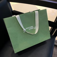 Sac d'emballage de luxe écologique en feuille chaude verte de qualité supérieure pour les bijoux de mode, les parfums, les bougies, les magasins de vêtements, l'emballage de sacs