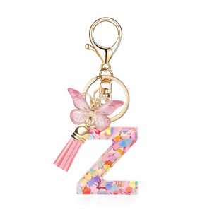 Llaveros <span class=keywords><strong>de</strong></span> Resina con Letras Iniciales <span class=keywords><strong>de</strong></span> la A a la Z, Colgante <span class=keywords><strong>de</strong></span> Mariposa, Borlas, Llaveros con Letras Iniciales del Alfabeto con Purpurina Rosa para Bolsos - Product Image 6