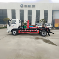 Camion à ordures hydraulique à bras articulé JMC 5cbm |   Camion de collecte des déchets à conteneurs amovibles pour l'assainissement municipal