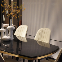 Table de salle à manger élégante en acier inoxydable or champagne brossé