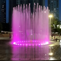 Fontaine de pont sec musicalecaractéristique de l'eau de danse circulaire extérieure Jet de sol interactif avec éclairage LED violet