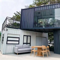 Conteneur ondulé bleu marine Apple Cabin House à deux niveaux avec toit incliné, auvent et fenêtre, idéal pour les comptoirs de magasins de centres commerciaux